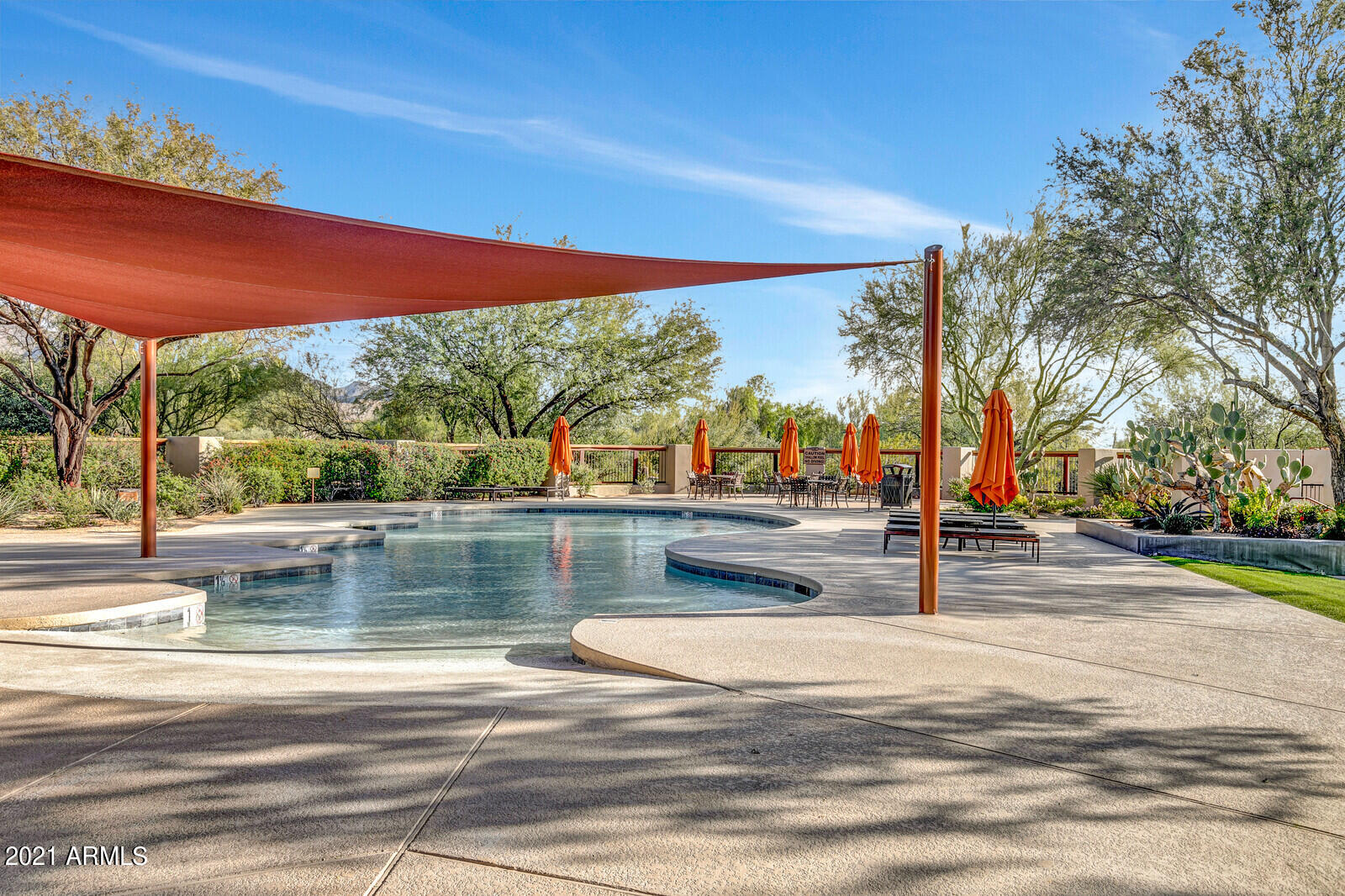 9270 East Thompson Peak Parkway, Unit 364 Scottsdale, AZ 85255 - Photo 40 of 45 a view of a swimming pool with a yard