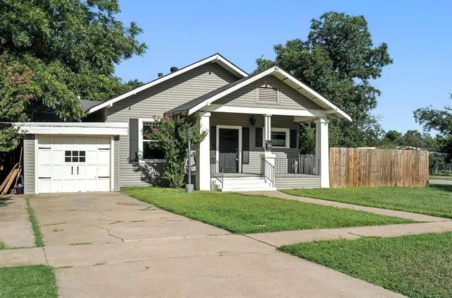 a view of a house and outdoor space with yard