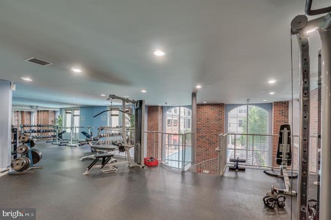 7 Booth Street, Unit 308 Gaithersburg, MD 20878 - Photo 18 of 21 a view of a room with gym equipment