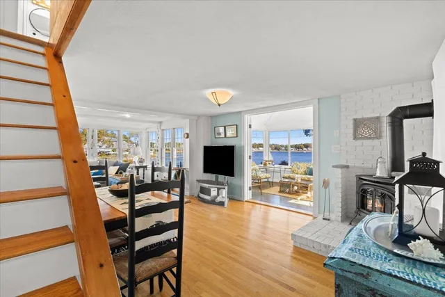 a view of a livingroom with furniture and a workspace