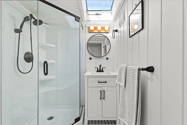 a bedroom with bed and balcony