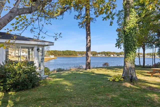 a house with trees in front of it