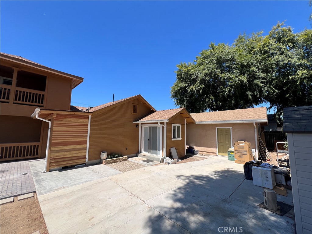 6952 Coolidge Avenue Riverside, CA 92506 - Photo 15 of 20 a front view of a house with a yard