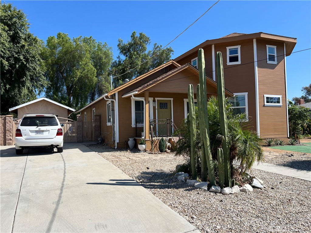 6952 Coolidge Avenue Riverside, CA 92506 - Photo 2 of 20 a front view of a house with a yard