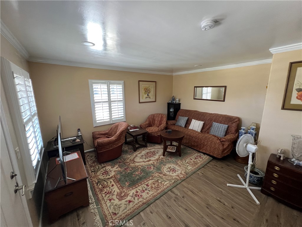 6952 Coolidge Avenue Riverside, CA 92506 - Photo 3 of 20 a living room with furniture and a couch
