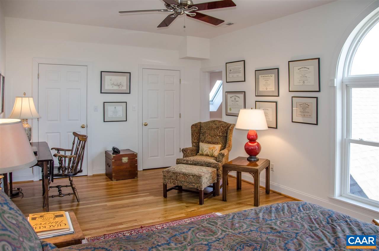 136 Fishpond Road Howardsville, VA 24562 - Photo 28 of 49 a living room with furniture and wooden floor