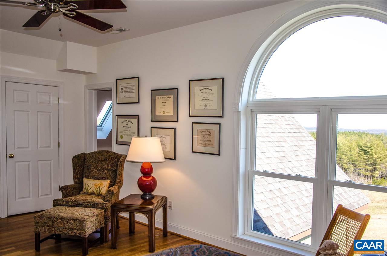 136 Fishpond Road Howardsville, VA 24562 - Photo 29 of 49 a living room with furniture and a window