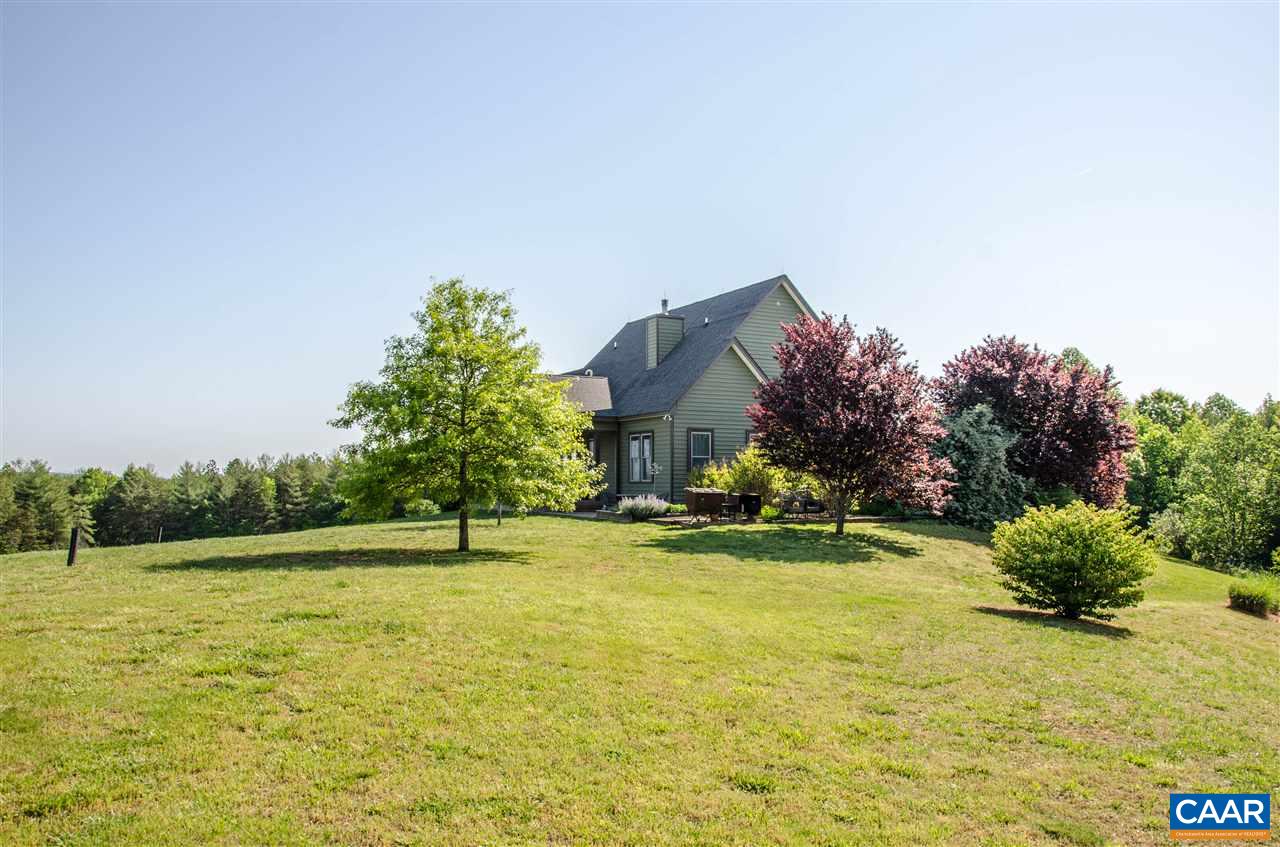 136 Fishpond Road Howardsville, VA 24562 - Photo 41 of 49 a house with swimming pool in front of it