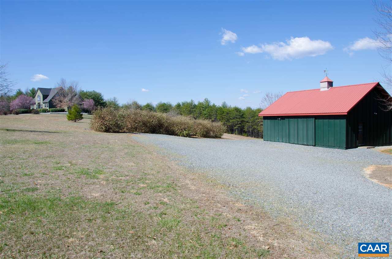 136 Fishpond Road Howardsville, VA 24562 - Photo 47 of 49 a view of a house with a yard and garage