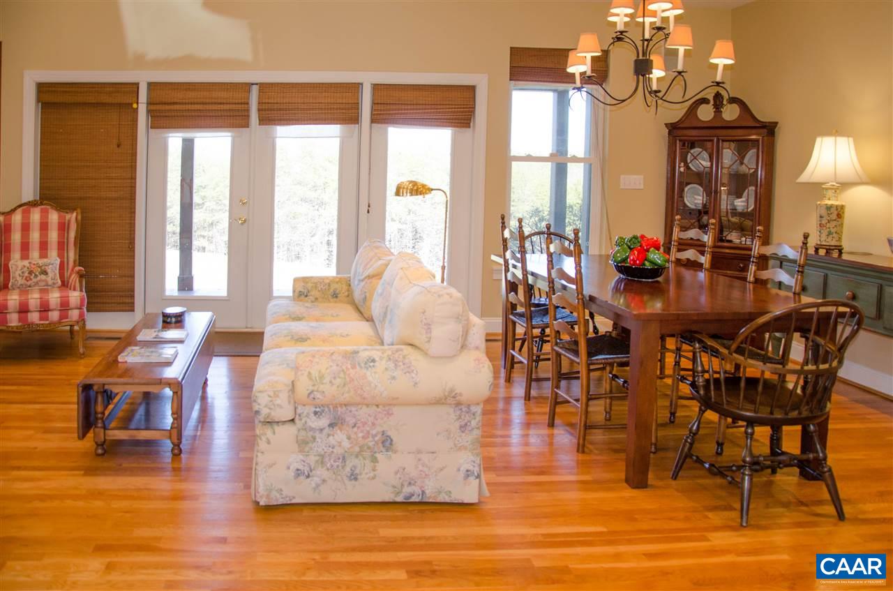 136 Fishpond Road Howardsville, VA 24562 - Photo 5 of 49 a view of dining room and hall with furniture