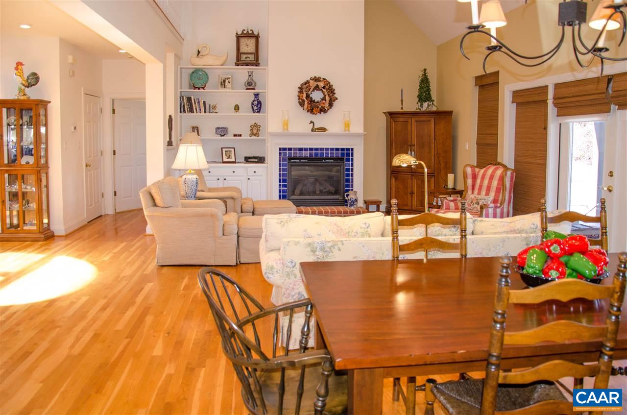 136 Fishpond Road Howardsville, VA 24562 - Photo 8 of 49 a view of a dining room with furniture and a chandelier