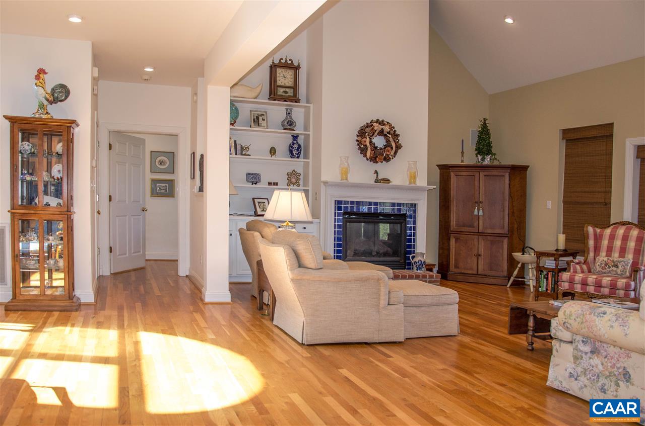 136 Fishpond Road Howardsville, VA 24562 - Photo 9 of 49 a living room with furniture and a fireplace
