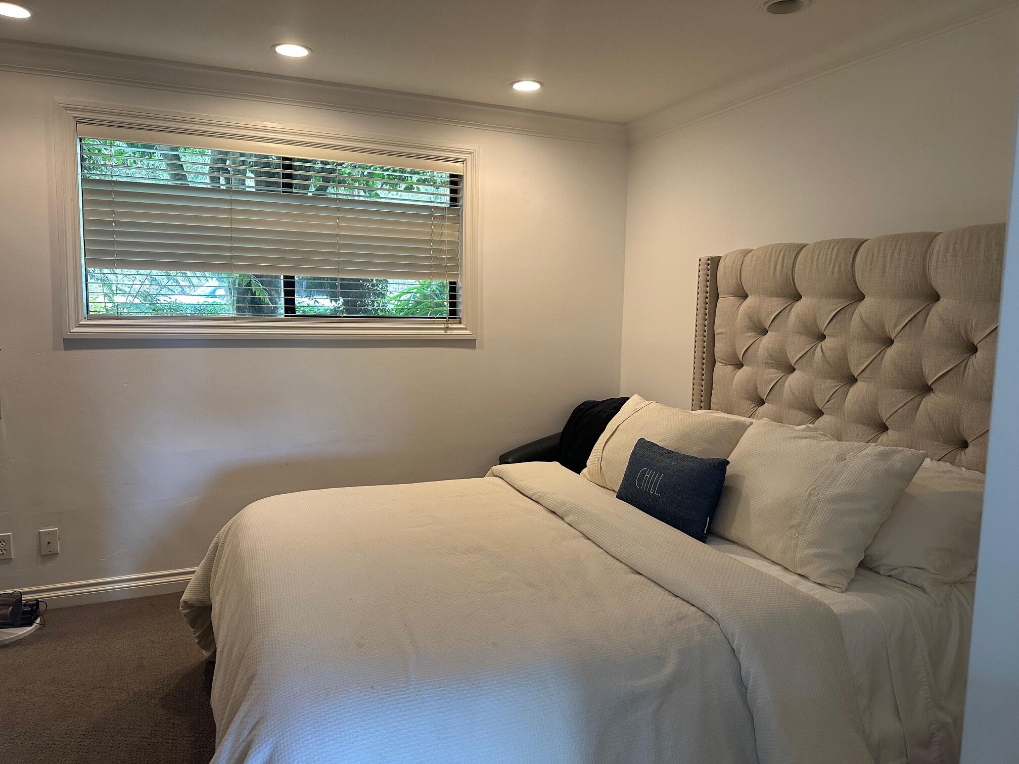 3375 Foothill Road, Unit 1114 Carpinteria, CA 93013 - Photo 12 of 17 a bedroom with a bed and a window