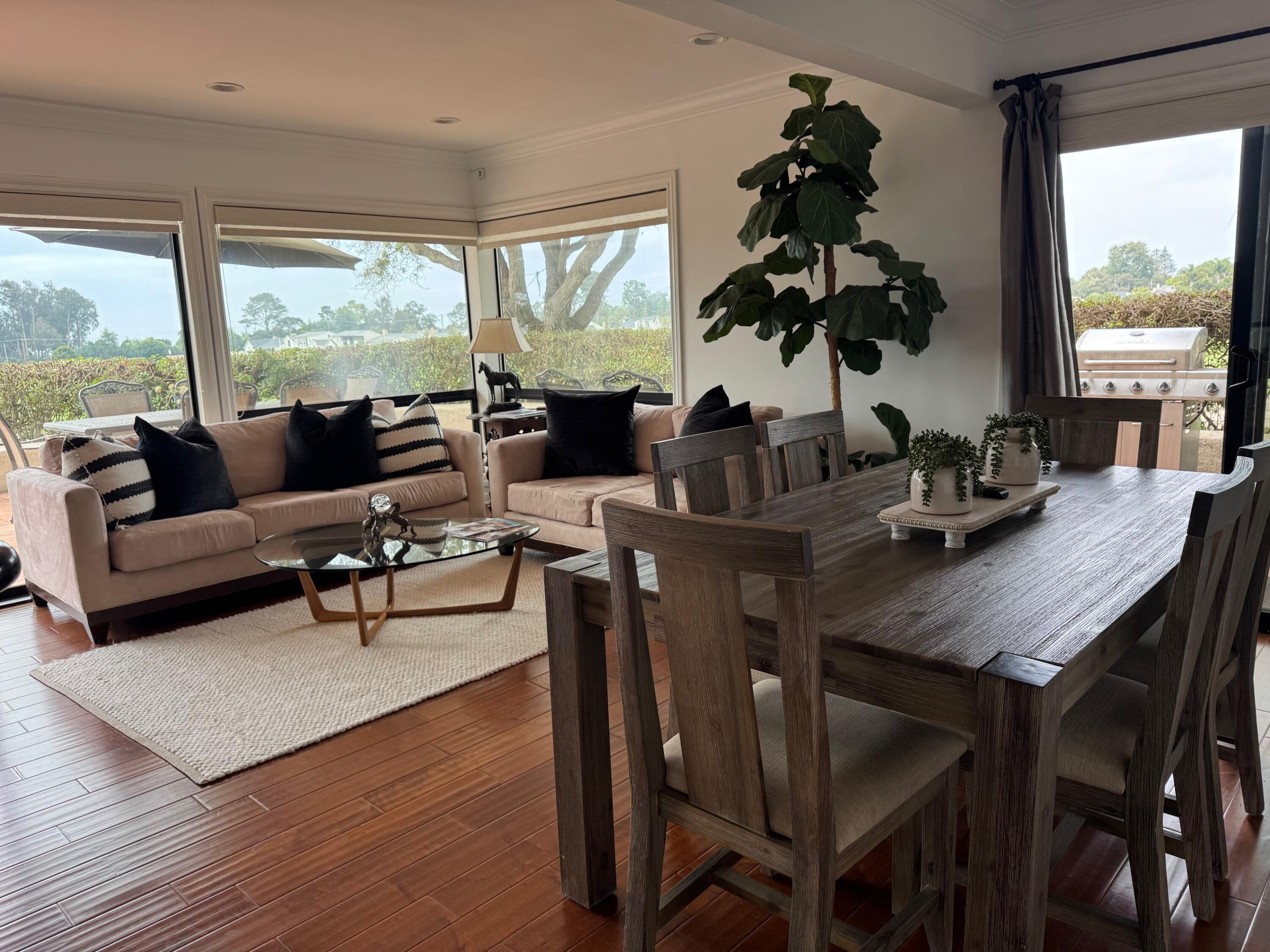 3375 Foothill Road, Unit 1114 Carpinteria, CA 93013 - Photo 2 of 17 a living room with furniture and a large window