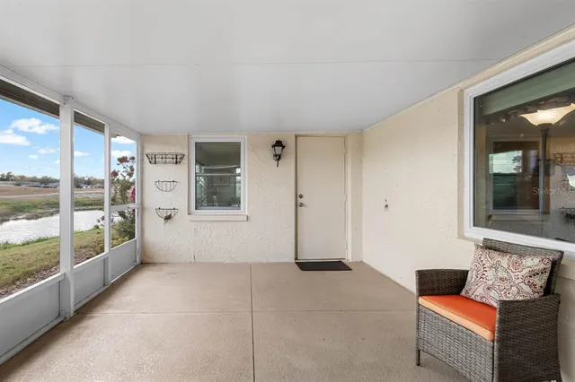 a view of a house with backyard and garage
