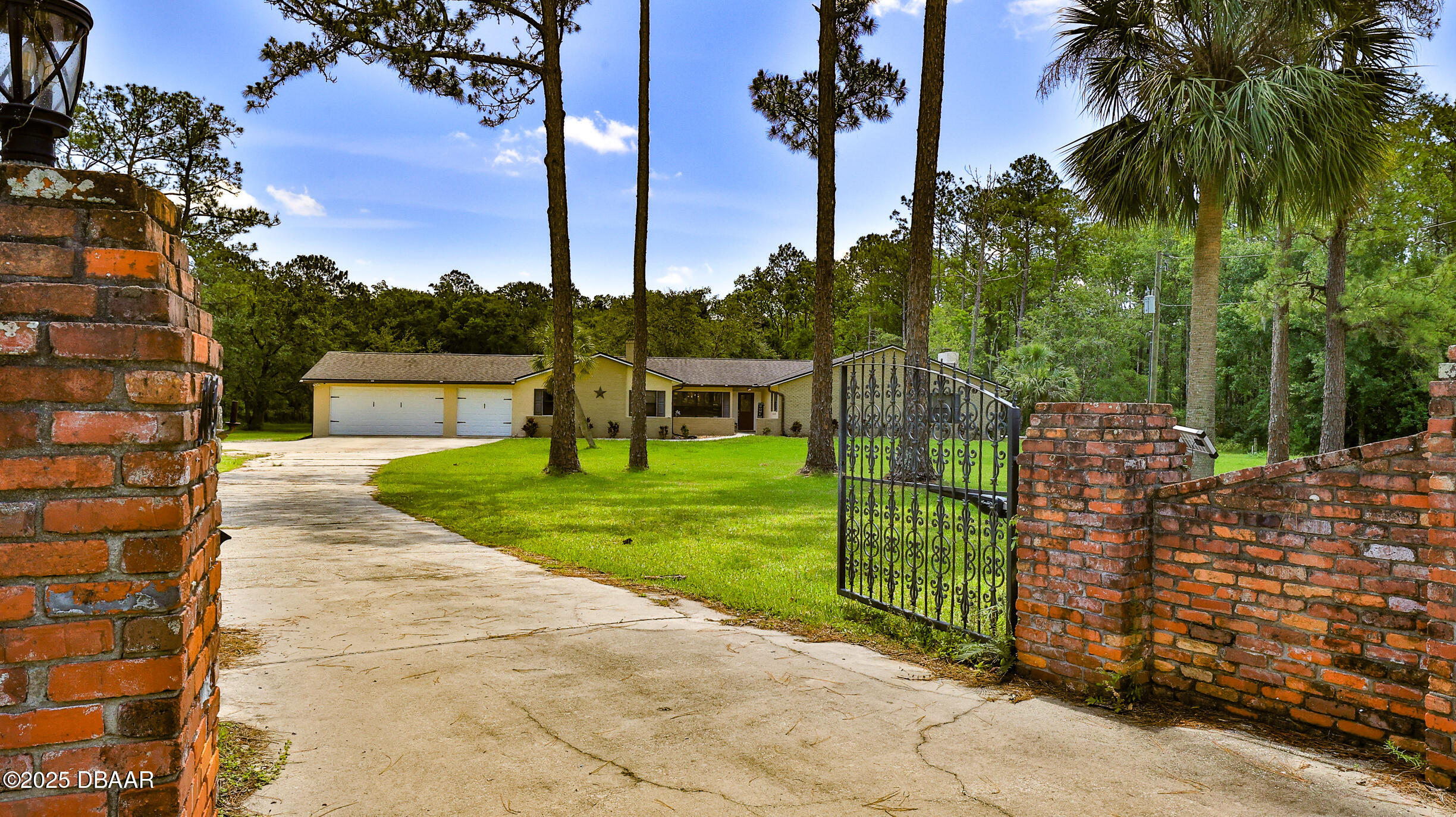 103 Cone Road Ormond Beach, FL 32174 - Photo 2 of 55 Gated Entrance