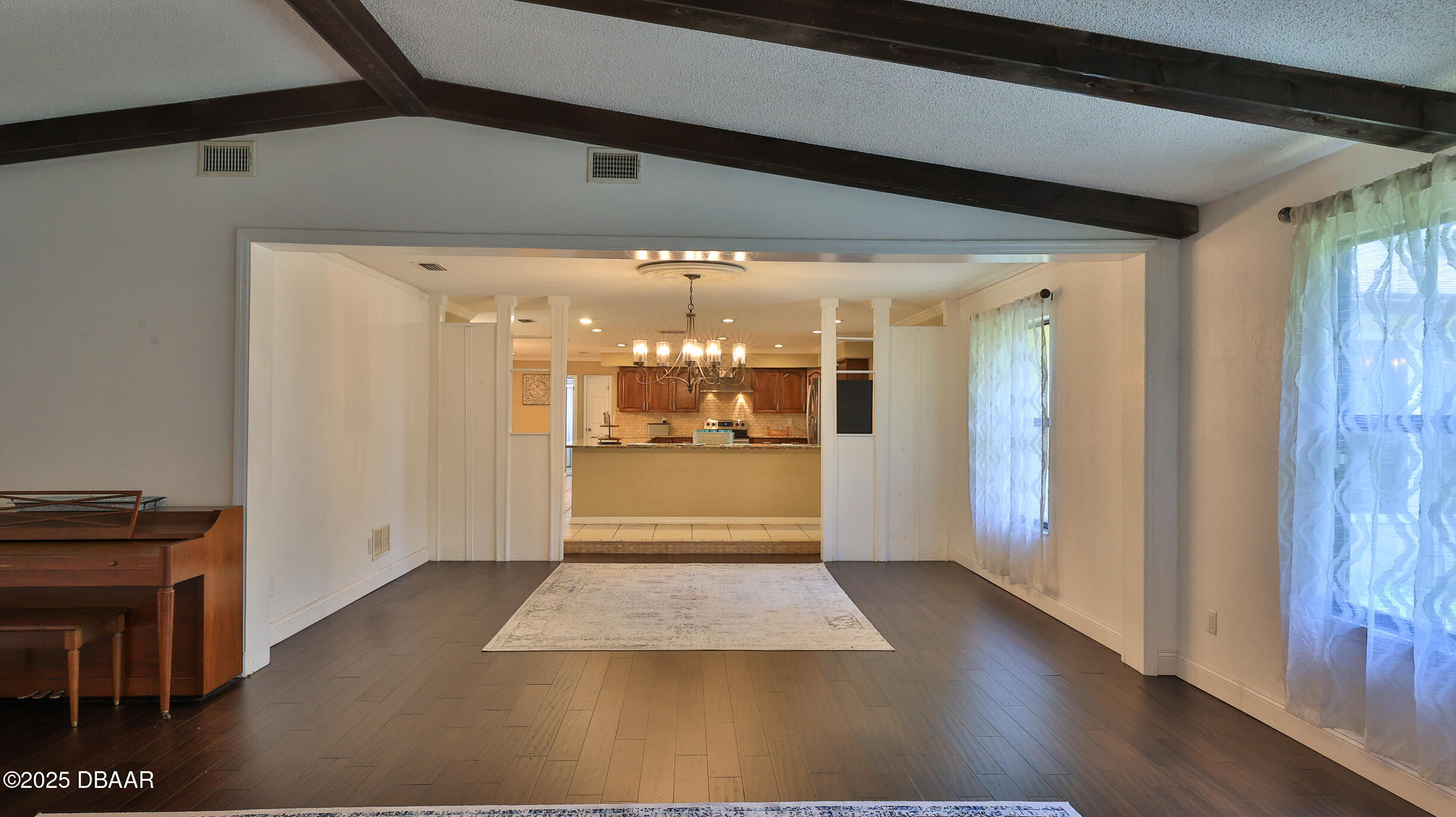 103 Cone Road Ormond Beach, FL 32174 - Photo 20 of 55 Fireplace to Kitchen