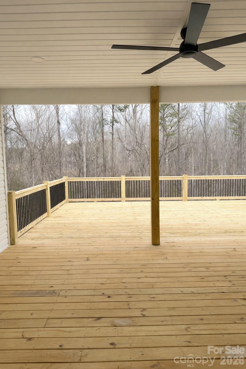 5135 Star Magnolia Court Clover, SC 29710 - Photo 26 of 39 a view of empty room with wooden floor and fan