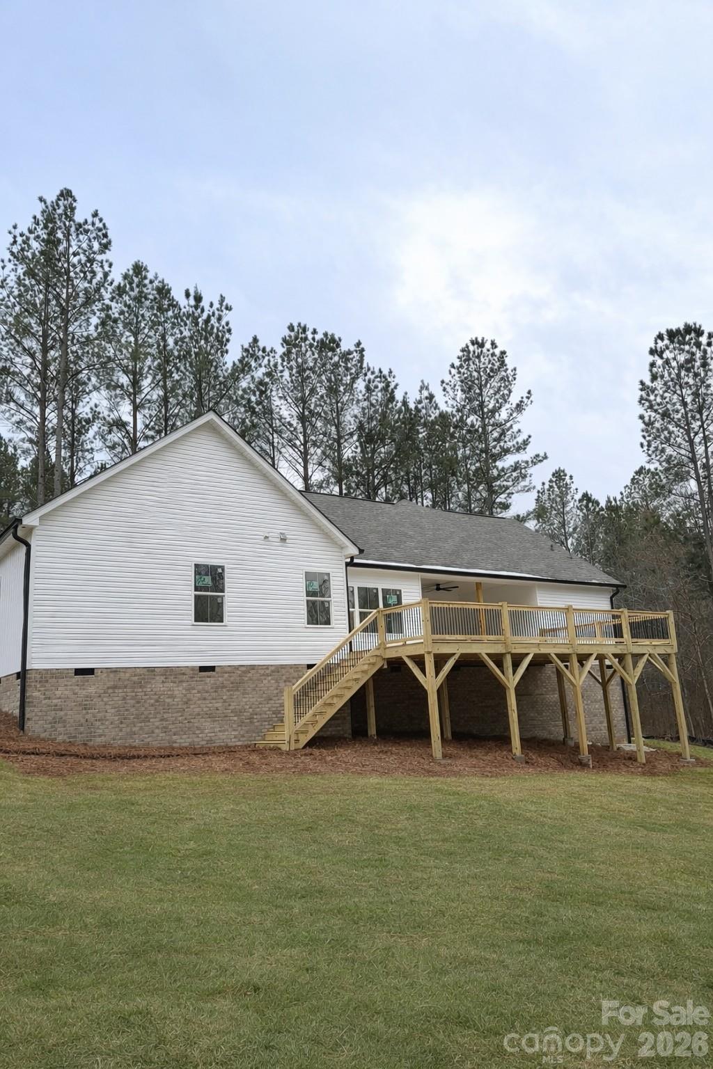 5135 Star Magnolia Court Clover, SC 29710 - Photo 35 of 39 a view of a patio with furniture and garden