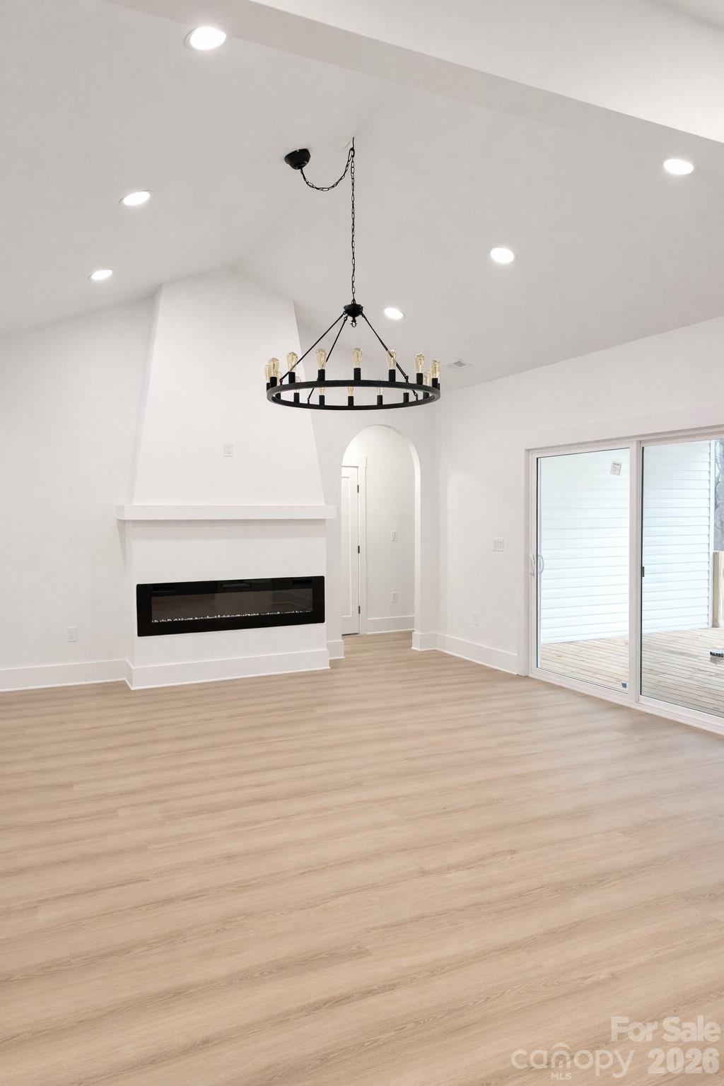 5135 Star Magnolia Court Clover, SC 29710 - Photo 5 of 39 a view of a room with wooden floor and ceiling fan