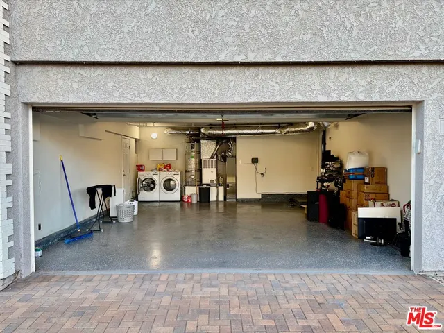 a view of a livingroom with gym equipment