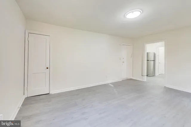 an empty room with an entryway