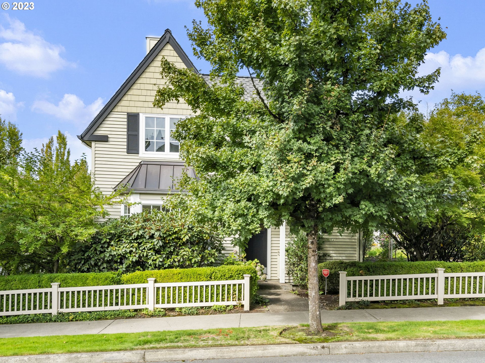 2265 Northwest Miller Road Portland, OR 97229 - Photo 1 of 31 a view of a house with a deck and a yard