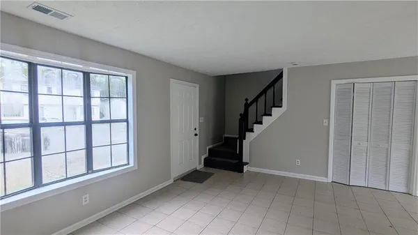 a view of an entryway with stairs