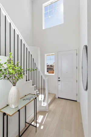 a view of entryway with wooden floor