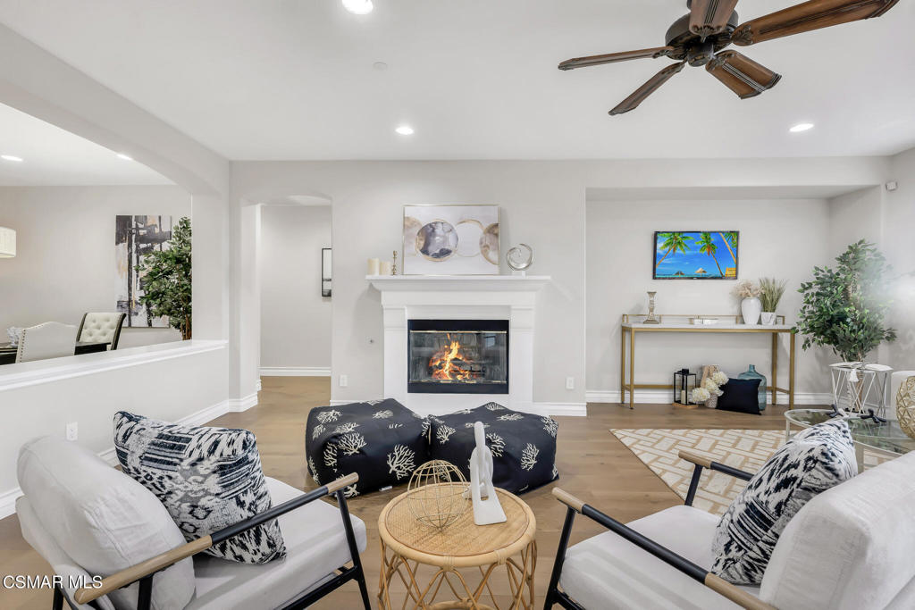 3421 Deep Waters Court Simi Valley, CA 93065 - Photo 16 of 74 a living room with furniture and a fireplace
