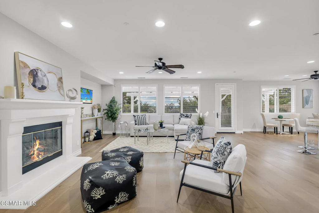 3421 Deep Waters Court Simi Valley, CA 93065 - Photo 17 of 74 a living room with furniture and a fireplace