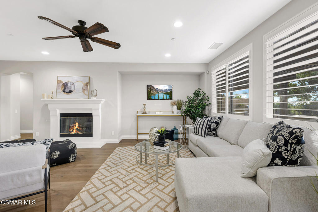 3421 Deep Waters Court Simi Valley, CA 93065 - Photo 22 of 74 a living room with furniture and a fireplace