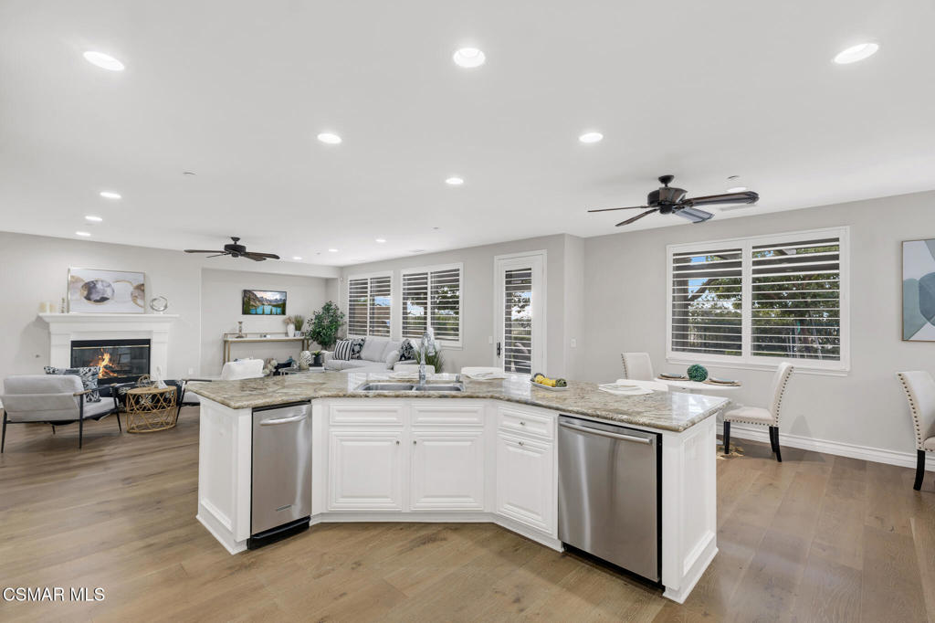 3421 Deep Waters Court Simi Valley, CA 93065 - Photo 31 of 74 a kitchen with a sink stove and cabinets