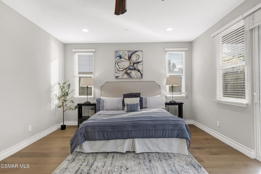 3421 Deep Waters Court Simi Valley, CA 93065 - Photo 35 of 74 a bedroom with a large bed and a table