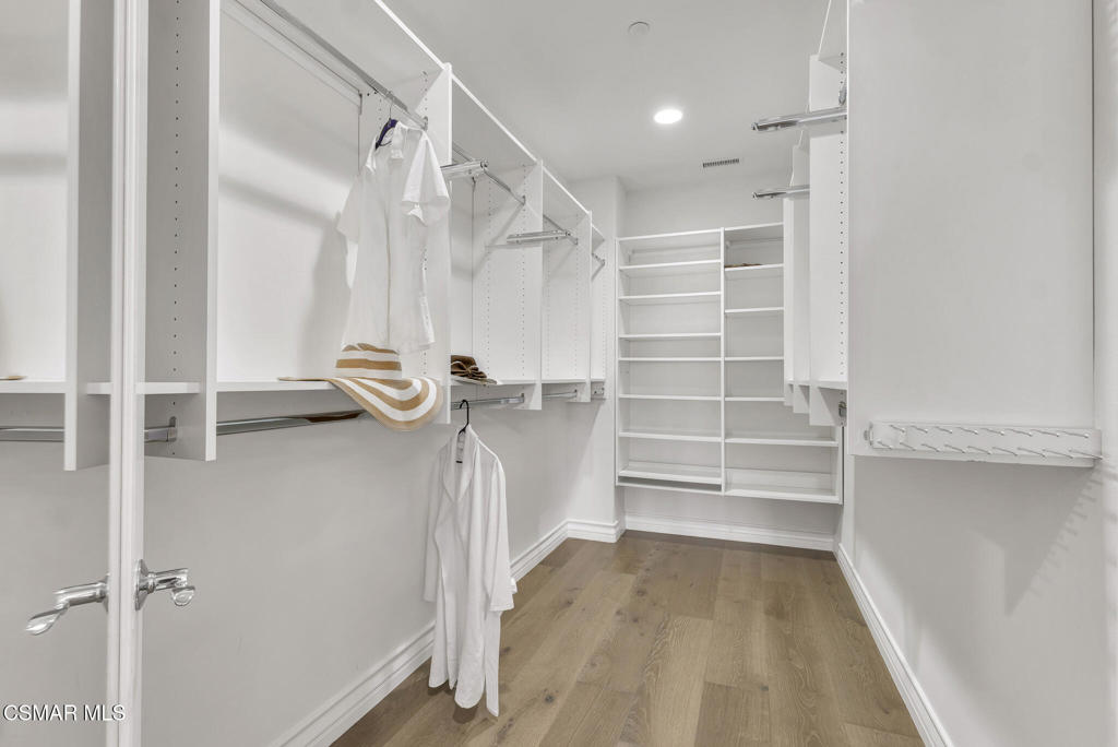 3421 Deep Waters Court Simi Valley, CA 93065 - Photo 39 of 74 a view of walk in closet with empty racks