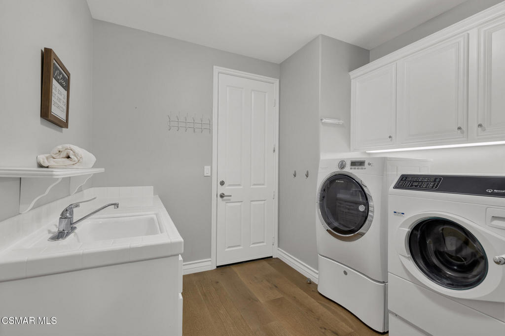 3421 Deep Waters Court Simi Valley, CA 93065 - Photo 43 of 74 a utility room with sink dryer and washer