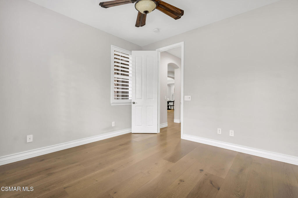 3421 Deep Waters Court Simi Valley, CA 93065 - Photo 51 of 74 an empty room with a empty space and chandelier fan