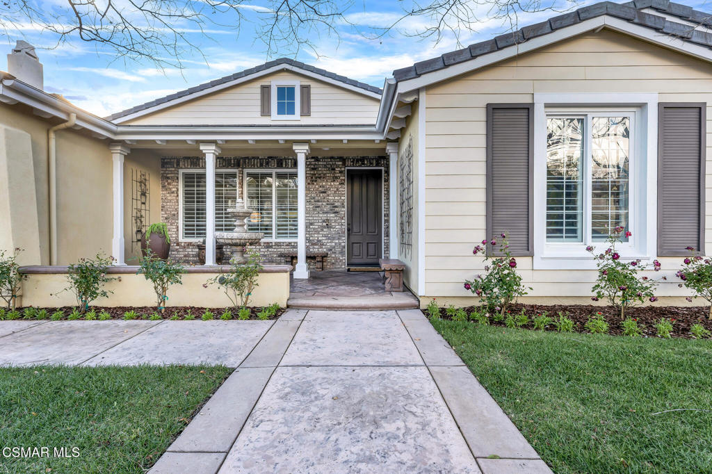 3421 Deep Waters Court Simi Valley, CA 93065 - Photo 6 of 74 a front view of a house with a yard and potted plants