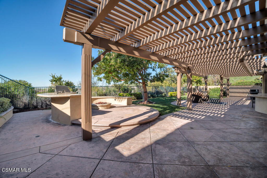 3421 Deep Waters Court Simi Valley, CA 93065 - Photo 64 of 74 a view of a patio with table and chairs potted plants with wooden floor