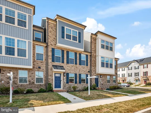 a front view of a building with street view