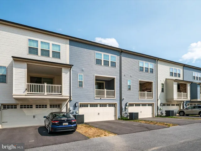a car parked in front of a house