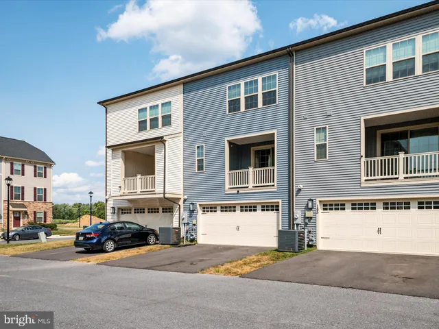 a car parked in front of a house