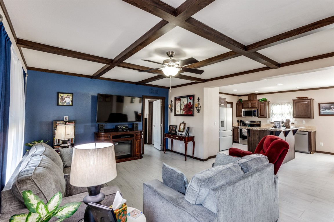 7905 Plato Path, Unit 111 Austin, TX 78724 - Photo 3 of 12 a living room with furniture and a flat screen tv