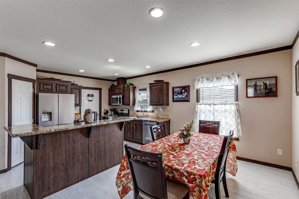 7905 Plato Path, Unit 111 Austin, TX 78724 - Photo 4 of 12 a dining room with furniture and window