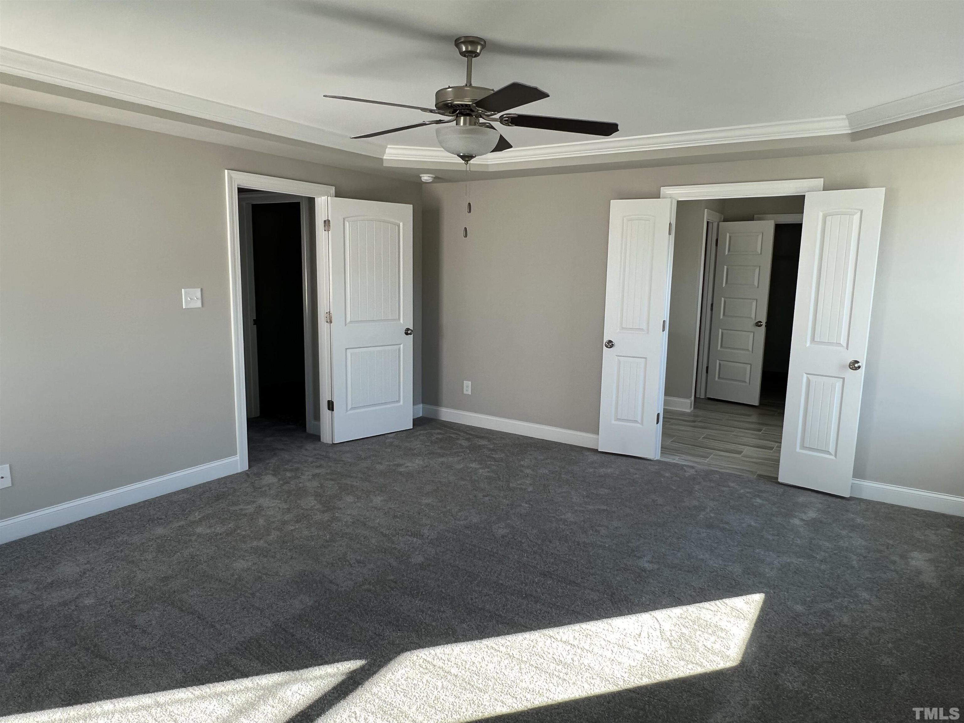 80 Unique Place Garner, NC 27529 - Photo 13 of 28 a view of a livingroom with a ceiling fan