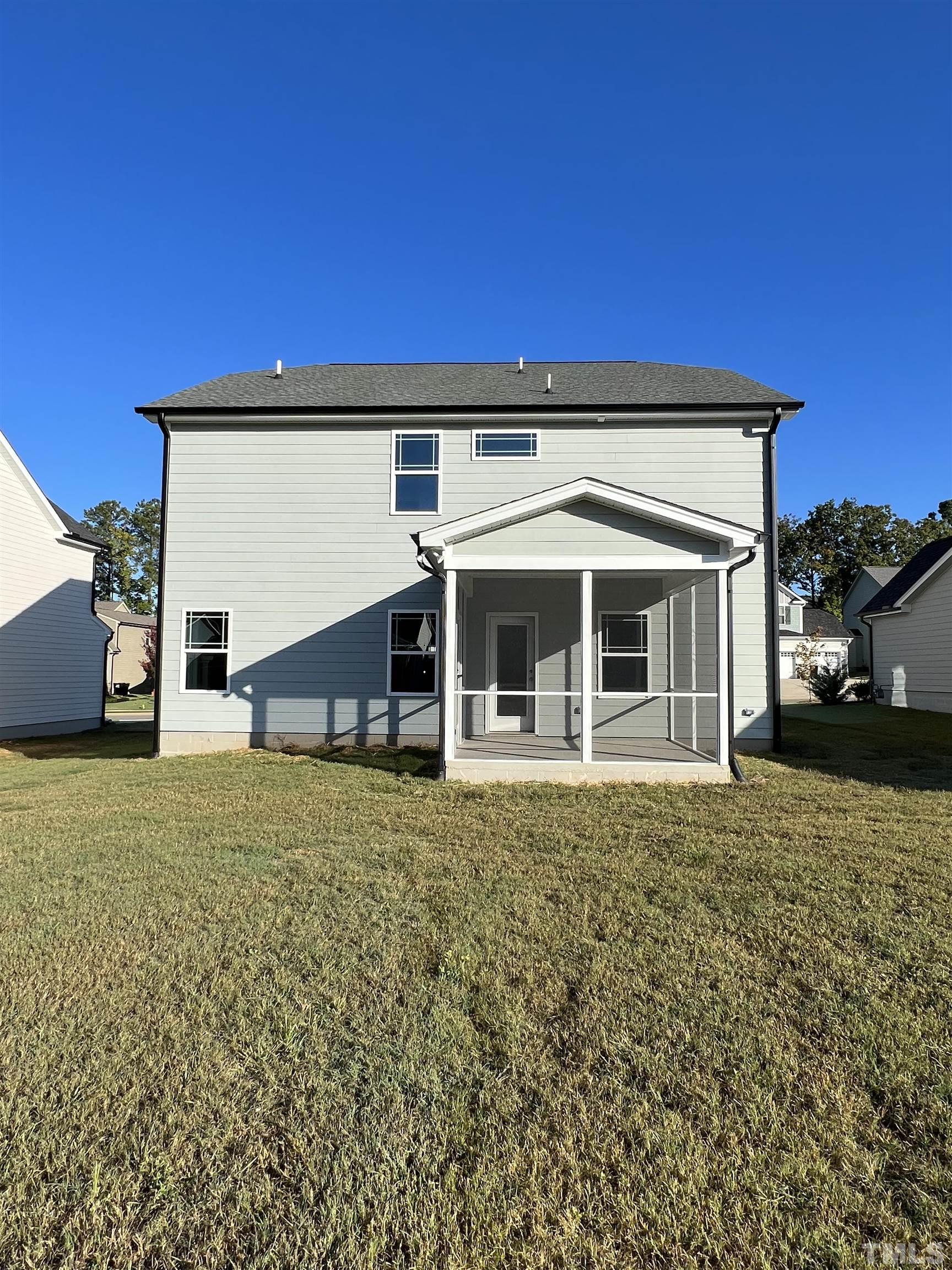80 Unique Place Garner, NC 27529 - Photo 27 of 28 front view of a house with a garden
