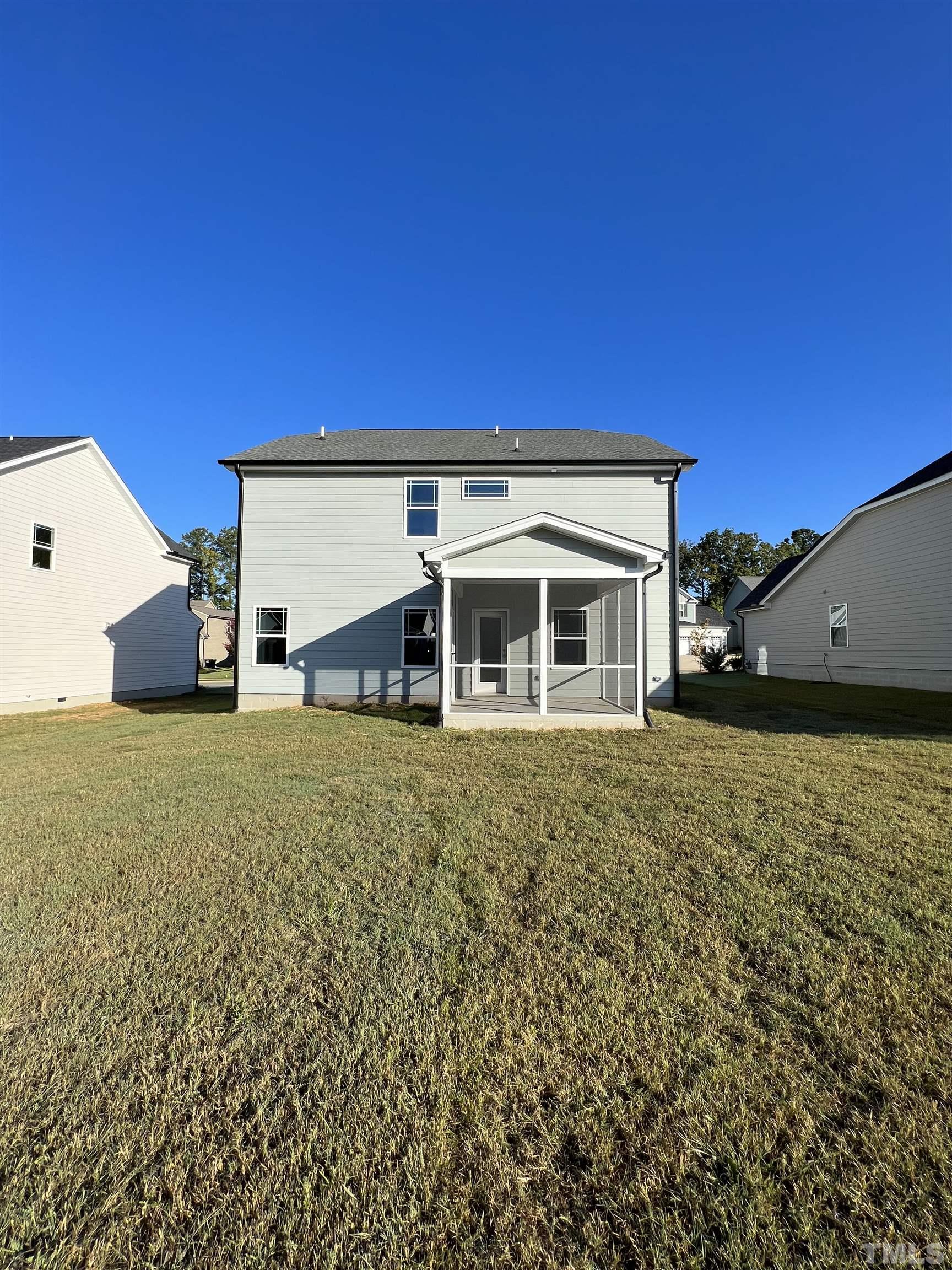80 Unique Place Garner, NC 27529 - Photo 28 of 28 a view of a house with a yard