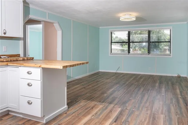 a view of a kitchen with cabinets