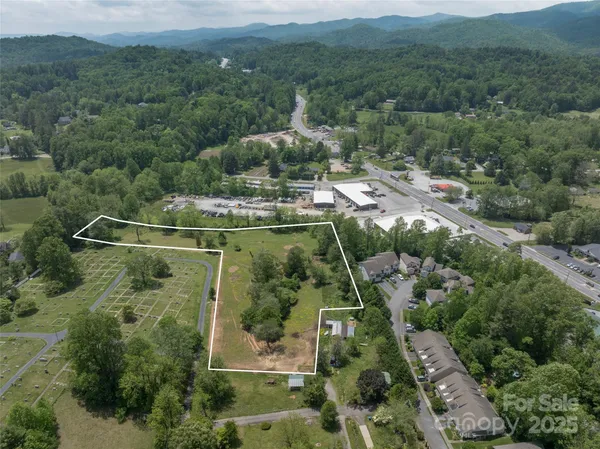 an aerial view of residential house with outdoor space