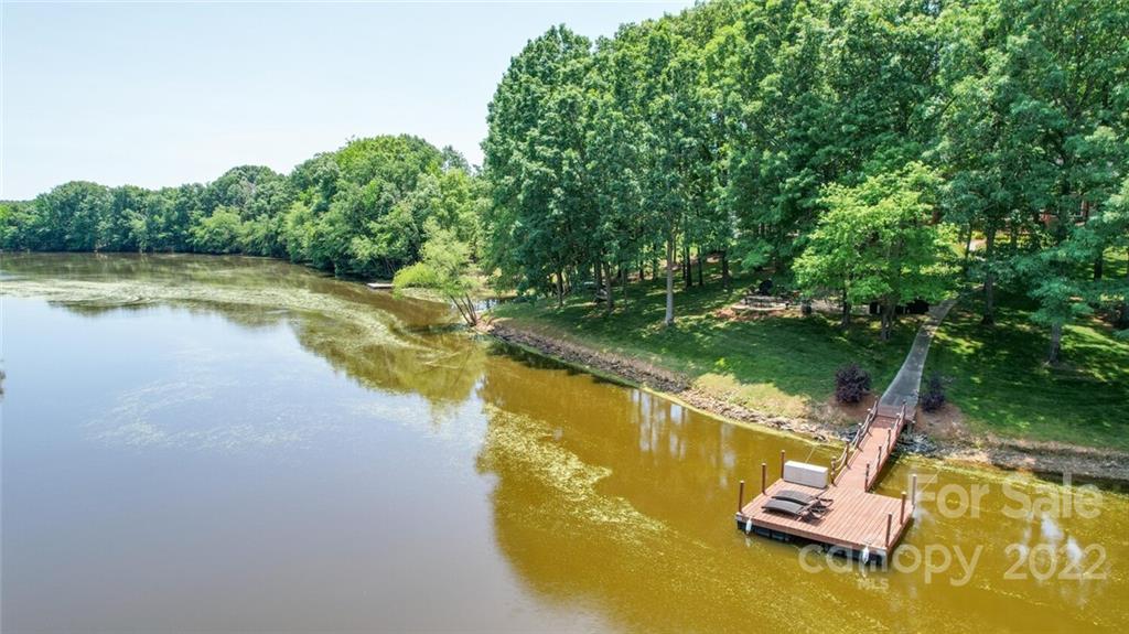 3617 Lake Twitty Drive Monroe, NC 28110 - Photo 11 of 47 a view of a swimming pool with a lake view